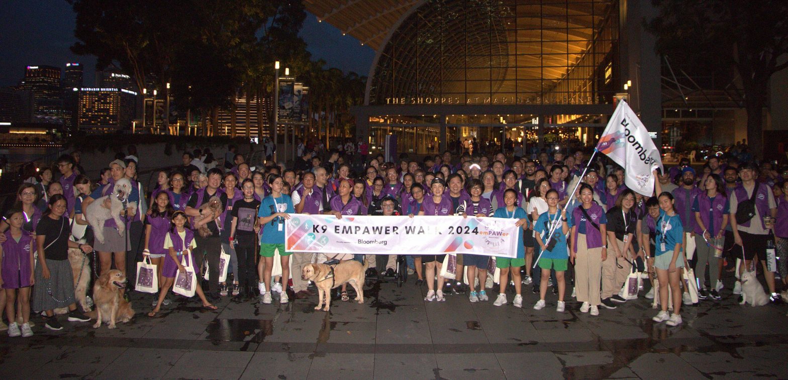 group photo with all participants of K9 EmPAWer Walk 2024